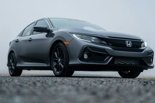 a black honda civic with black wheels